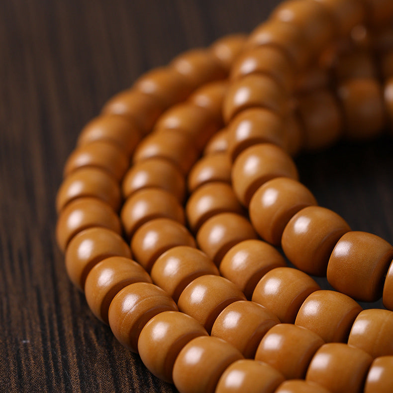 Xigura Patina handcrafted olive wood bracelet, slow living setting for a warm, quiet home.
