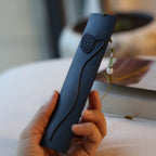 Xigura Patina handcrafted ebony bookmark, main view in soft natural light for a warm, quiet home.