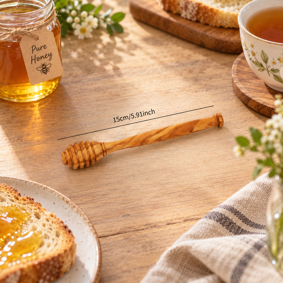 Olive wood honey dipper shown with a size guide for product scale and proportions.