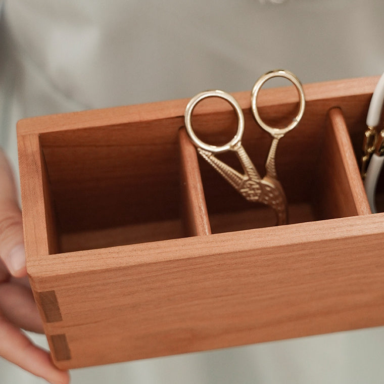 Wooden desk organizer for storing small tools, stationery, cosmetics, and personal accessories.