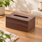 Wooden facial tissue box cover styled in a warm home setting for use on a desk, nightstand, or coffee table.