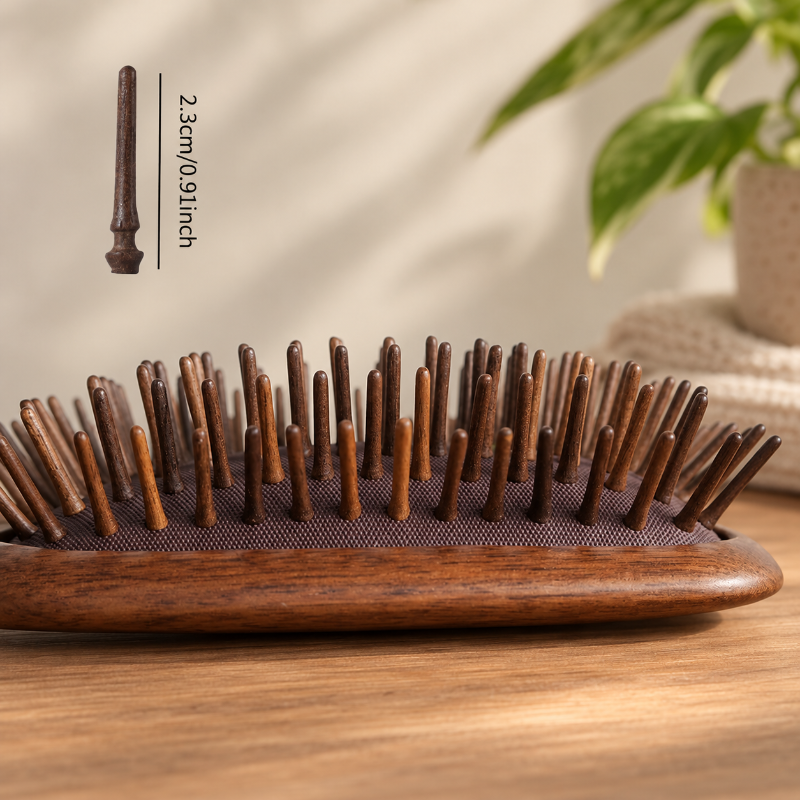 Wooden hair brush with a smooth black walnut handle designed for comfortable everyday use.