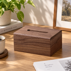 Wooden tissue box holder made from black walnut for neatly storing and dispensing facial tissues.